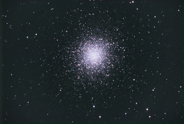 M13 -- The Hercules Cluster
M13 -- The Hercules Cluster, a globular cluster in Hercules.  Calibrated in MaximDL, aligned and stacked in CCDStack, color combine, deconvolution, and noise reduction in PixInsight, color balance in Photoshop.  The small galaxy in the upper left is IC 4617.
