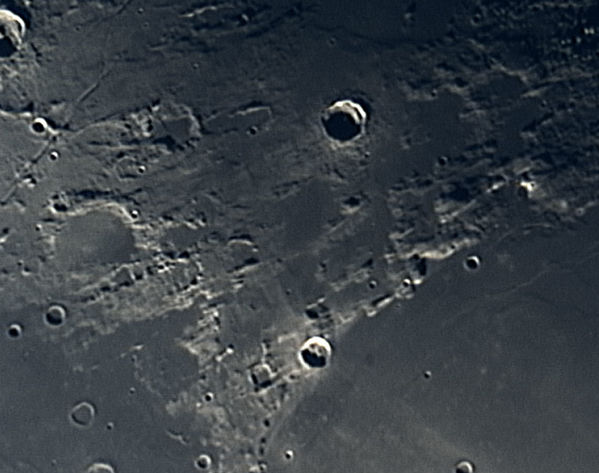 The Moon, December 18 2004
The Moon, captured in an AVI file, aligned, combined and sharpened in Registax, finished in Photoshop.
