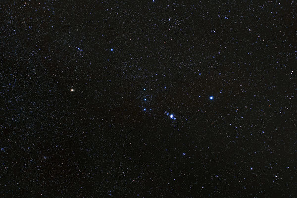 Orion
The constellation Orion.  The Orion Nebula is brightly visible and the flame can be faintly seen by the star Alnitac (lower one in the belt).
