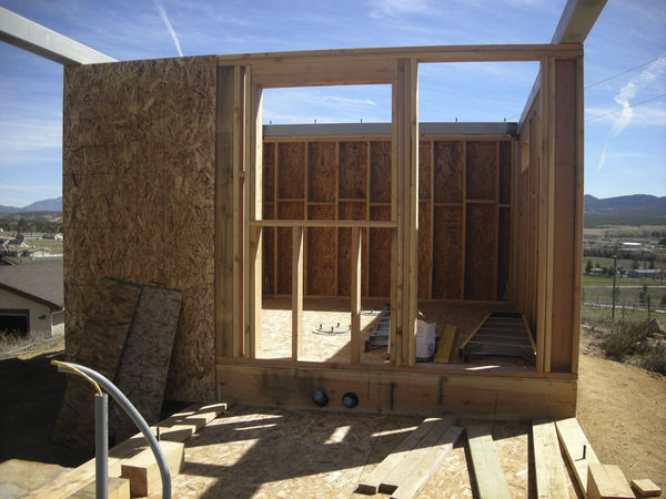 Observatory Framed - Close View
This view looks into the observatory from the warm room.  There are two two-inch conduits coming from the piers to the control room.  The door is on the right, with a window for viewing the equipment.

