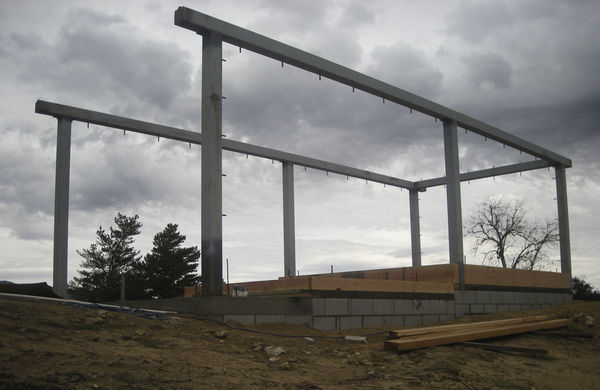 Steelhenge
The steel looms against the dark sky, evoking the image of Stonehenge.
